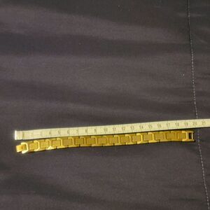 MENS GOLD PLATED FASHION BRACELET.